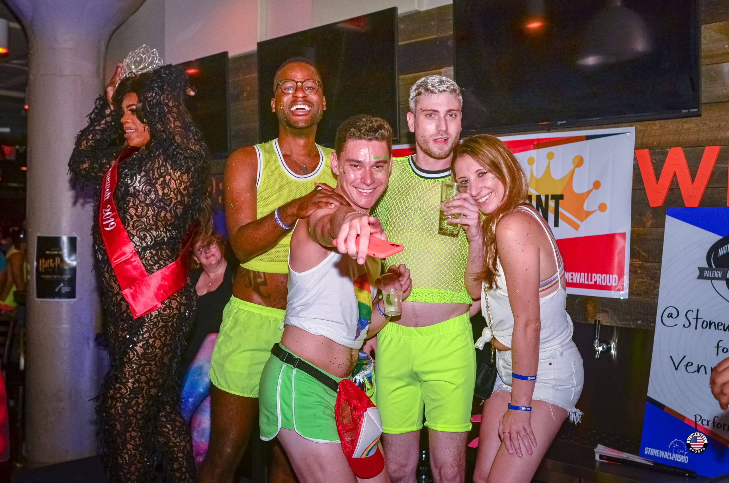 Folx in neon green having fun